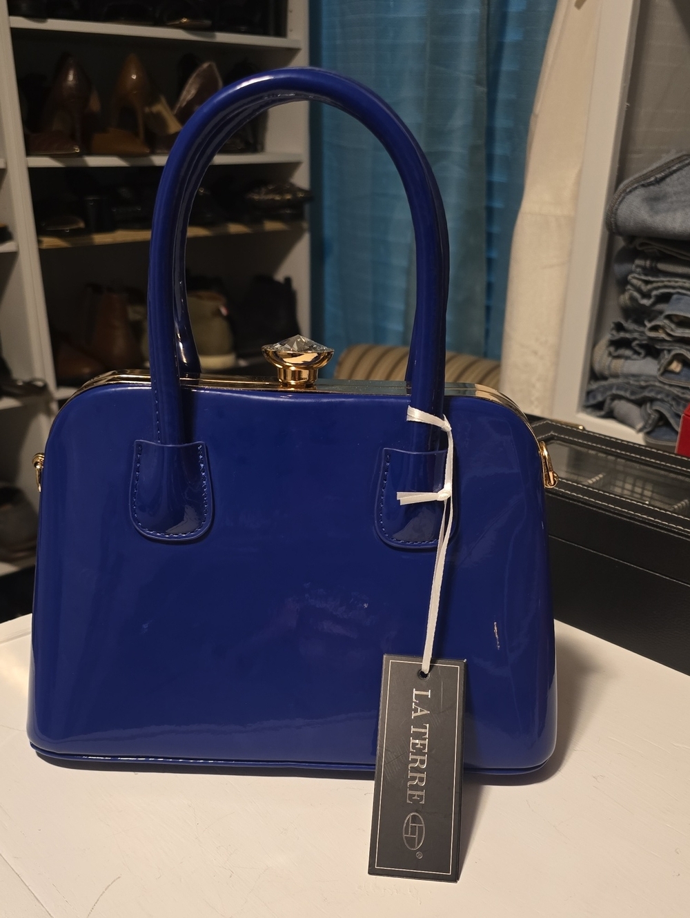 La Terre Royal Blue Patent Dome Satchel